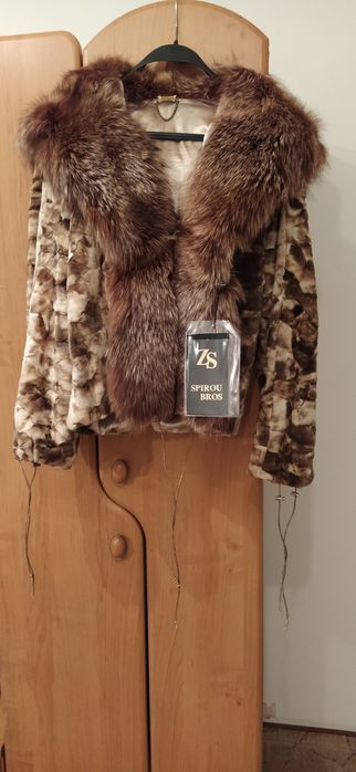 Vând haina de blana noua