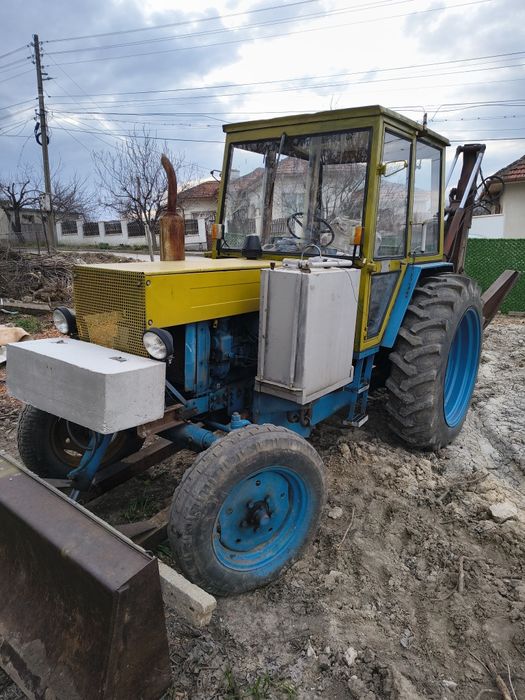 Комбиниран багер