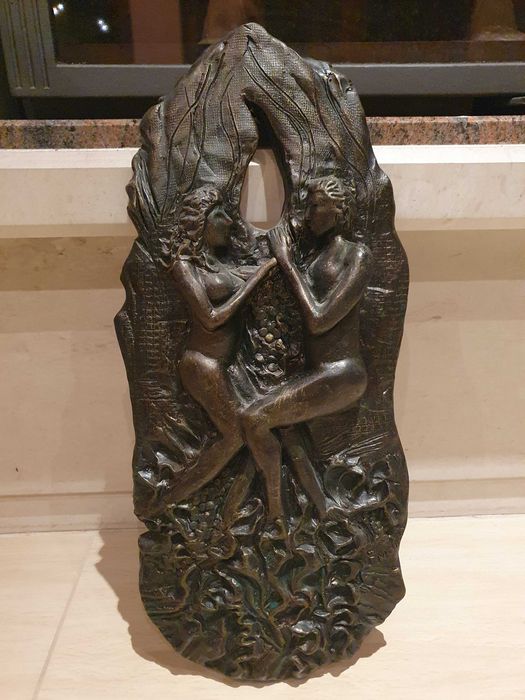 Скулптура за стена