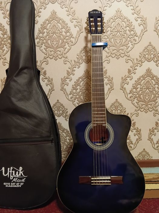 Gitara Sotiladi  holati yangi turkiyadan kelgan