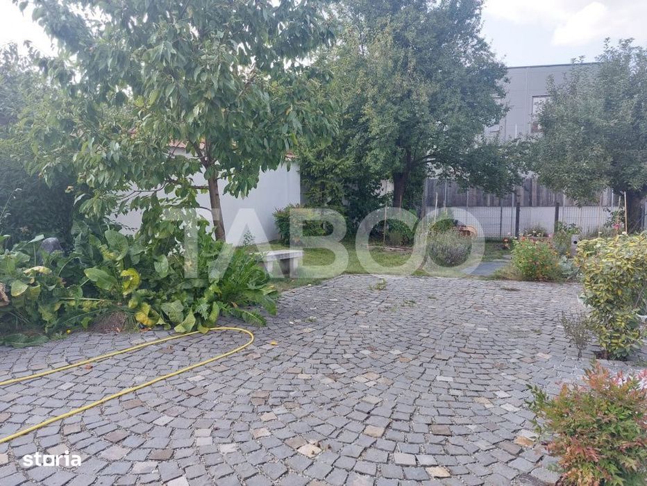 Apartament de vanzare 105 mp 3 camere curte 340 mp in acte Cisnadie