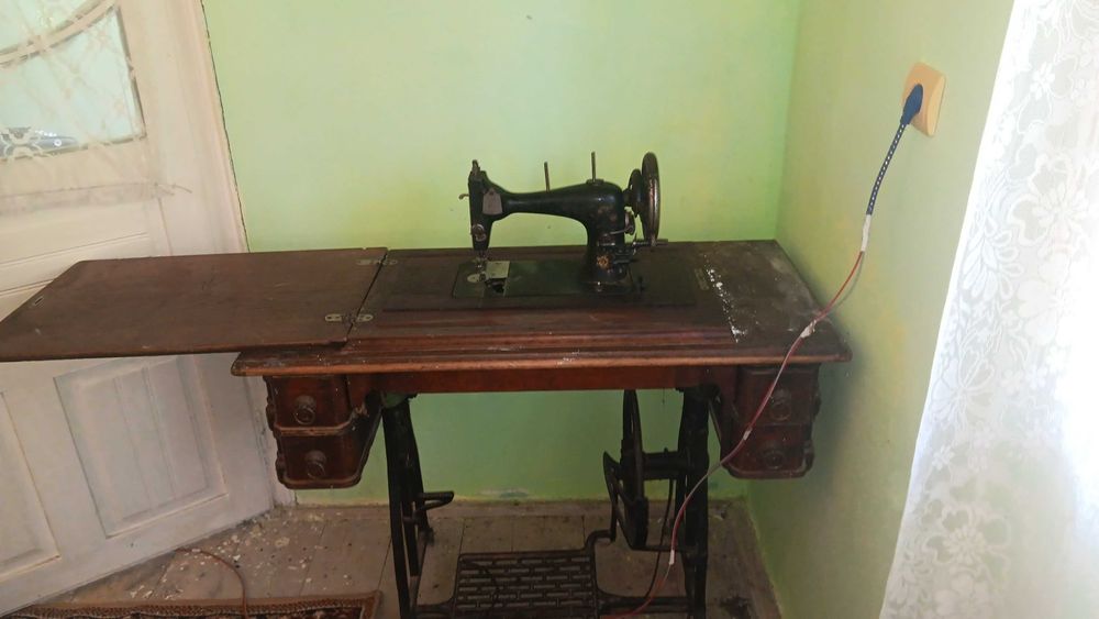 Vand masina de cusut