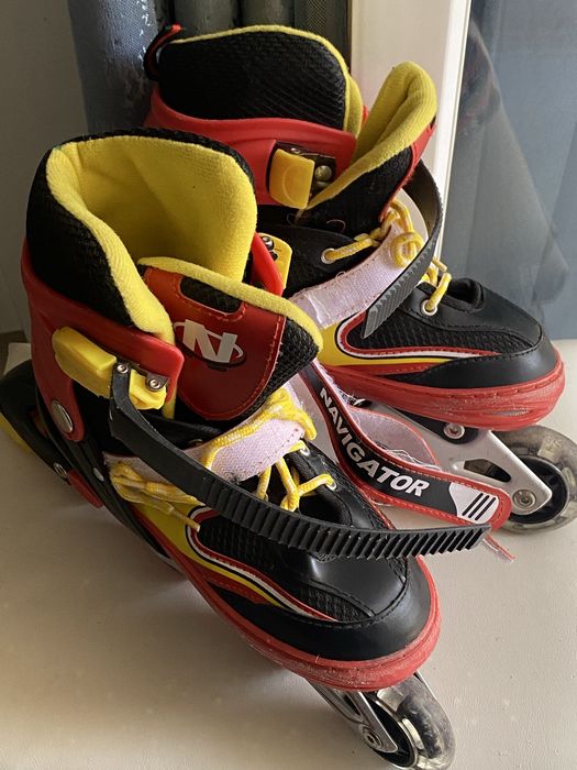 Роликовые коньки.