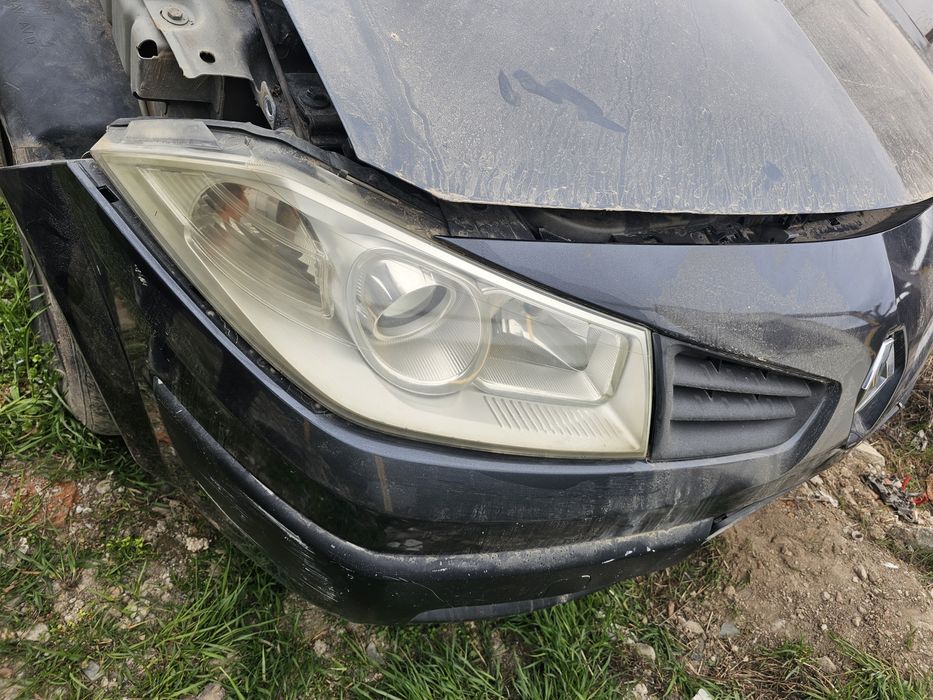 Far stânga dreapta cu lupa Renault megan 2 an 2005