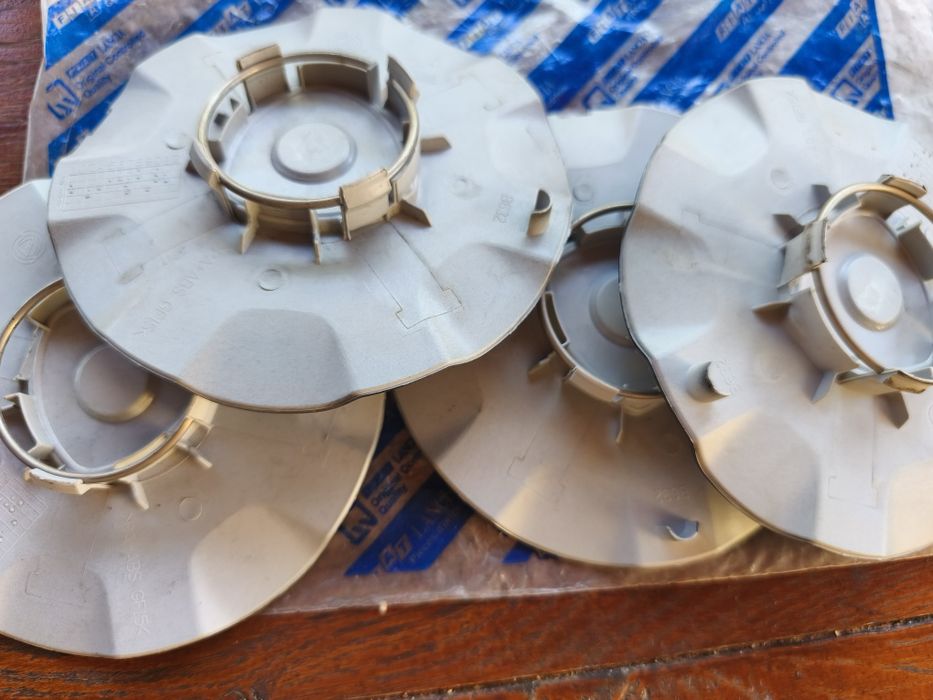 Set 4 capace centrale jante aliaj  Lancia (Delta,  Ypsilon)