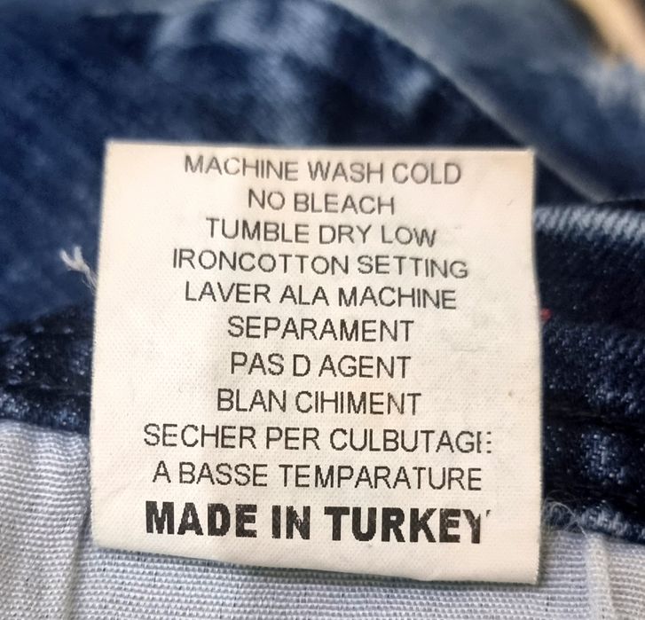 Джинсы рваные  Kenzo.