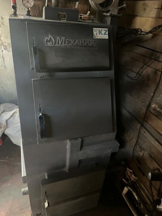 Котел длительного горения Механик