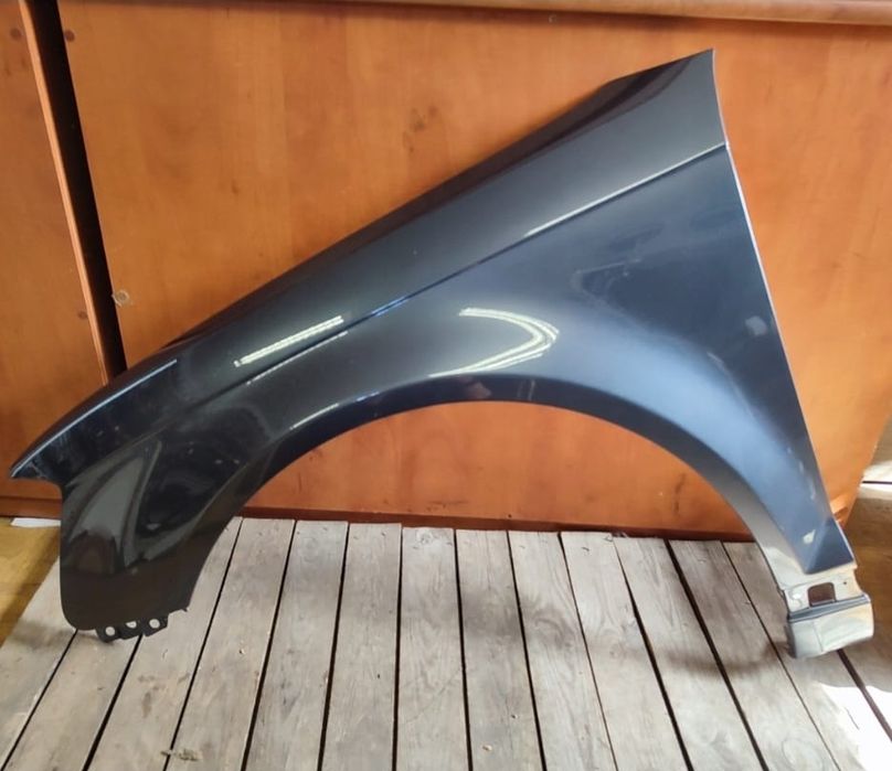 Aripa stanga fata NOUA vopsita gri  LZ7E Audi A3 8P  2008 - 2012