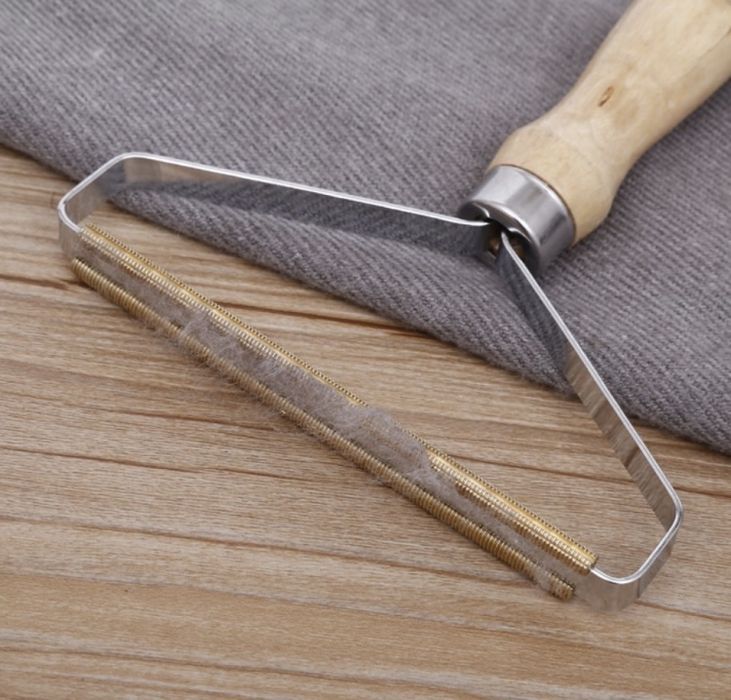 Уред за премахване на мъх и топчета от дрехите