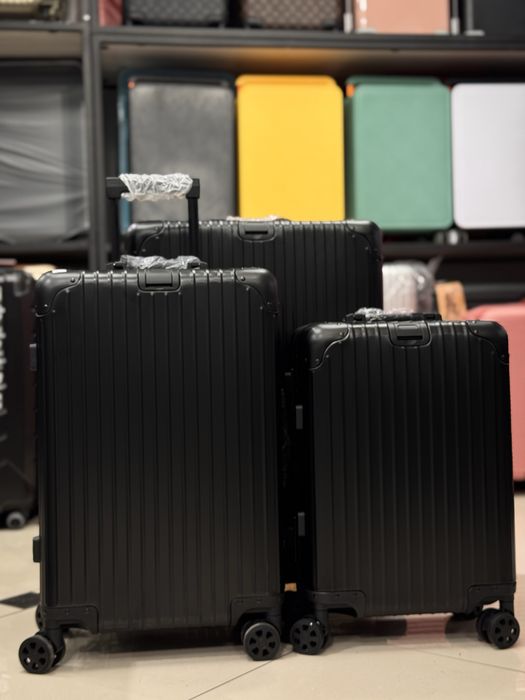 Чемоданы 4 колесные из алюминия