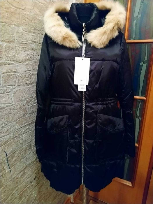 Продам новый зимний пуховик