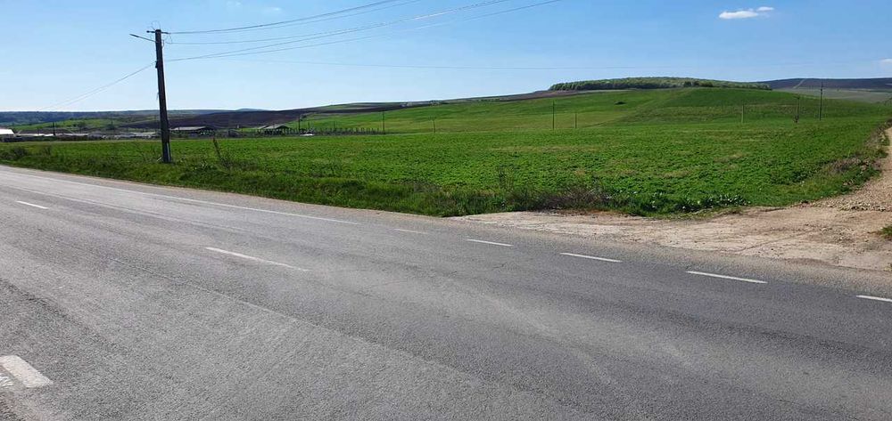 Vand 1 hectar teren intravilan, cu A.C. Hala Service camioane 1000 metri
