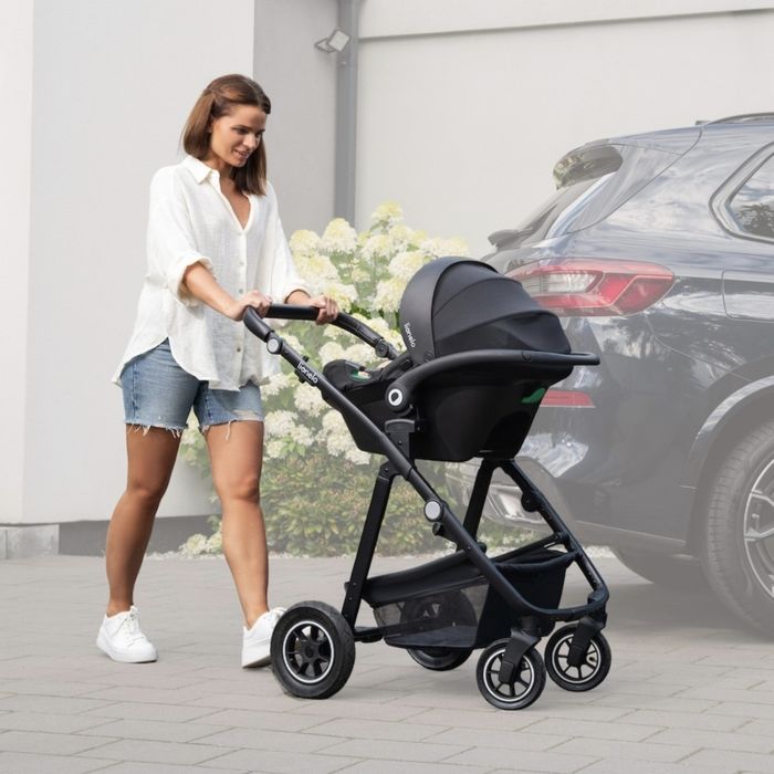 Scoica auto, Lionelo, i-Size Astrid + Baza scaun auto, 0-13 Kg, 40-87 cm, Cu maner si capotina reglabile, Cu protectie laterala avansata, Negru
