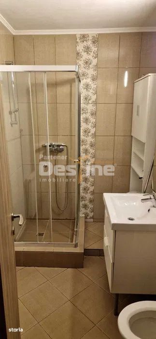 Apartament cu 2 camere decomandat la etaj intermediar, situat in carti