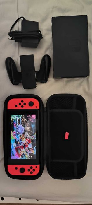 Nintendo Switch V1 MODAT – 64GB – dock + încărcător + grip + husa