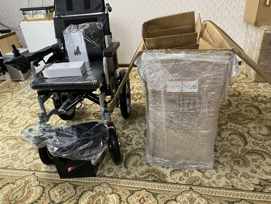 Электрическая коляска для инвалидов