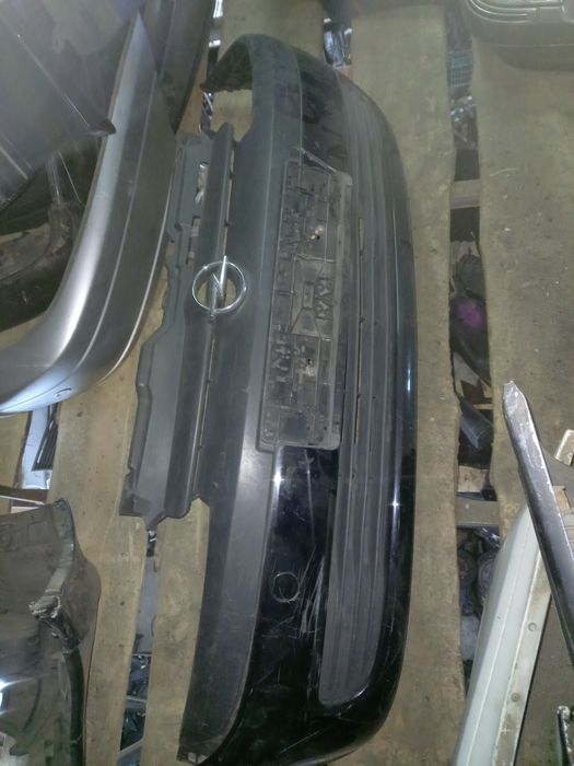 Бампер передний на Опель Корса D