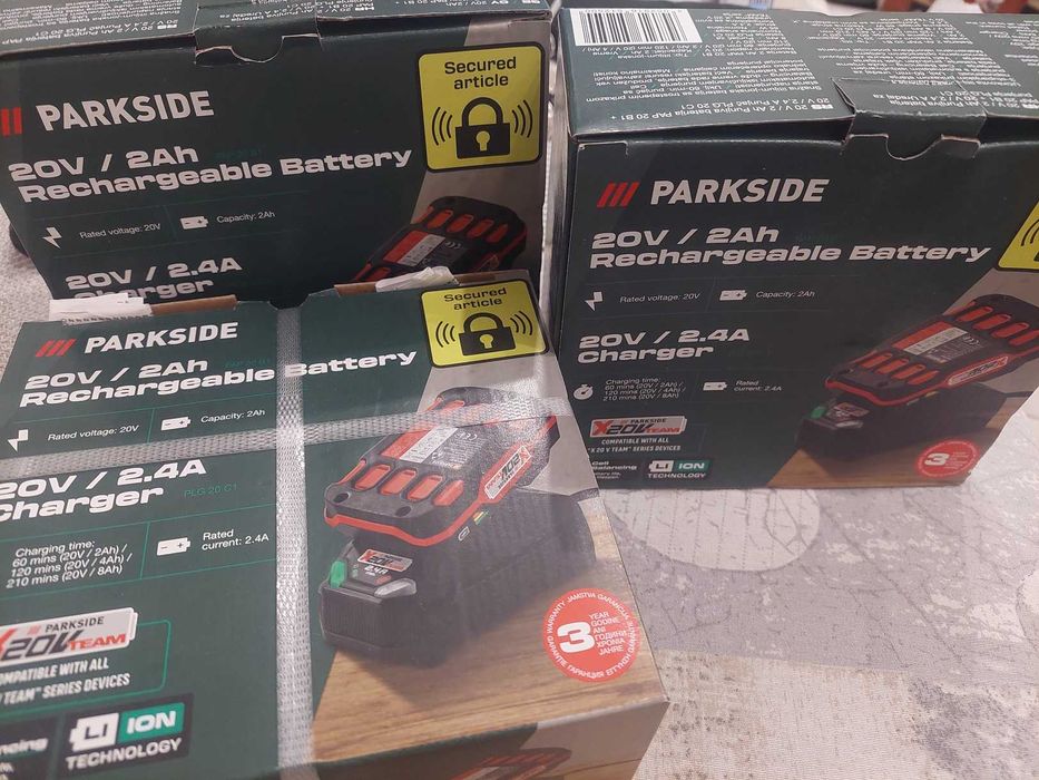 нови запечатани батерия и зарядно за лампи 20V Parkside