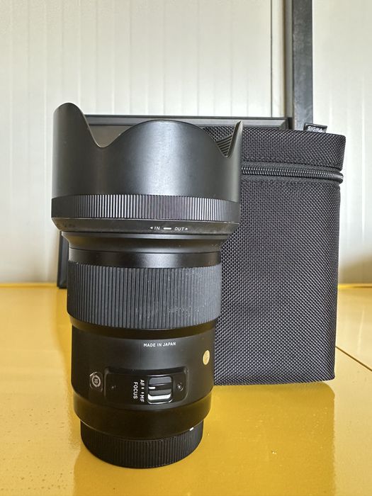 Obiectiv Sigma 50mm f/1.4 DG HSM Art (Montură Canon EF) + Husă & Parasolaru