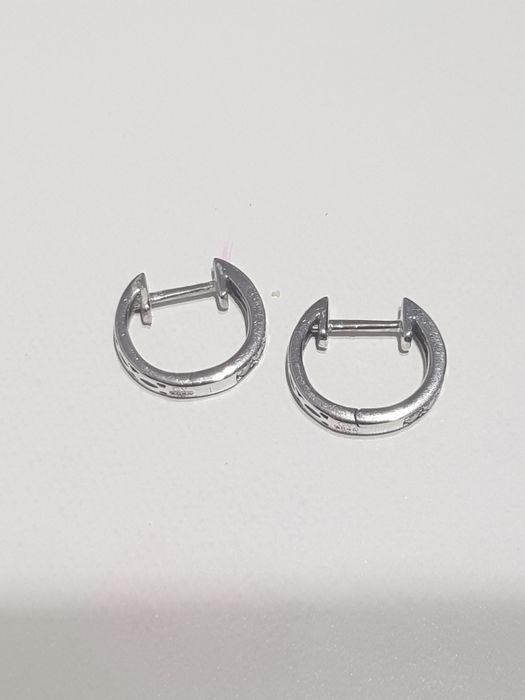 Cercei aur alb 18k cu 14 diamante