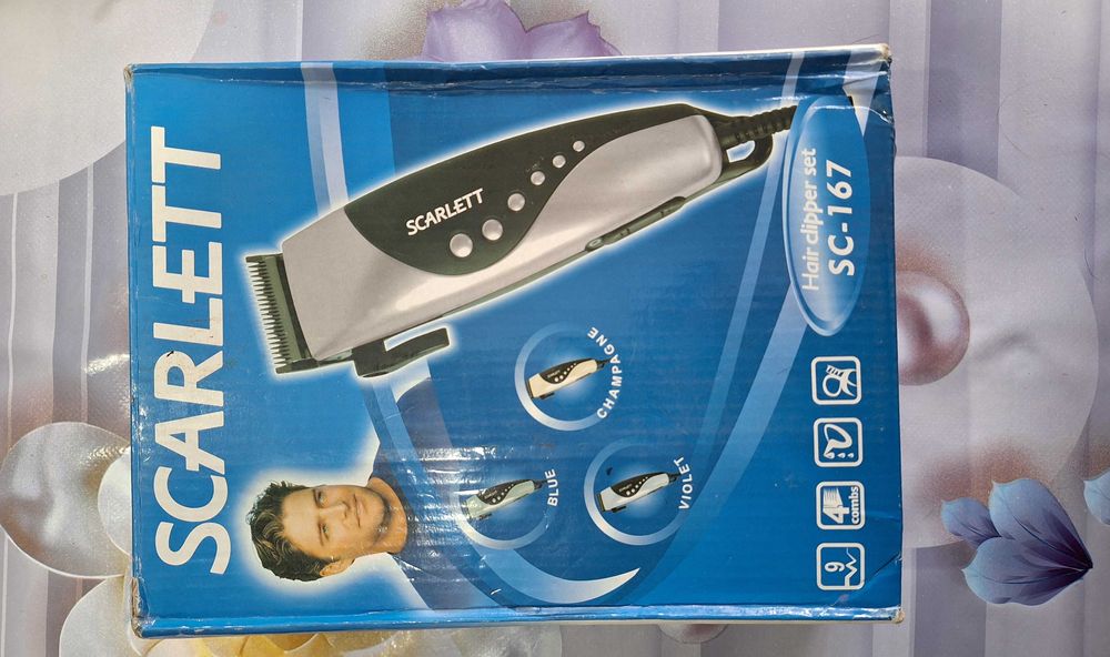 Машинка для стрижки волос.