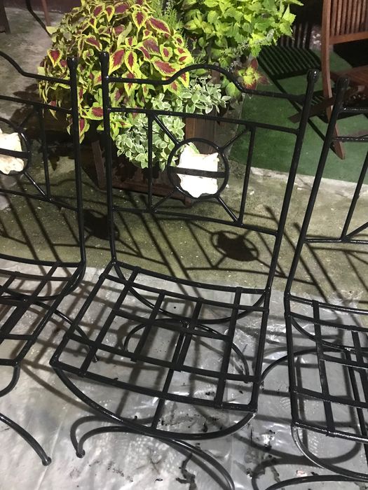 Scaune de grădina din fier forjat .