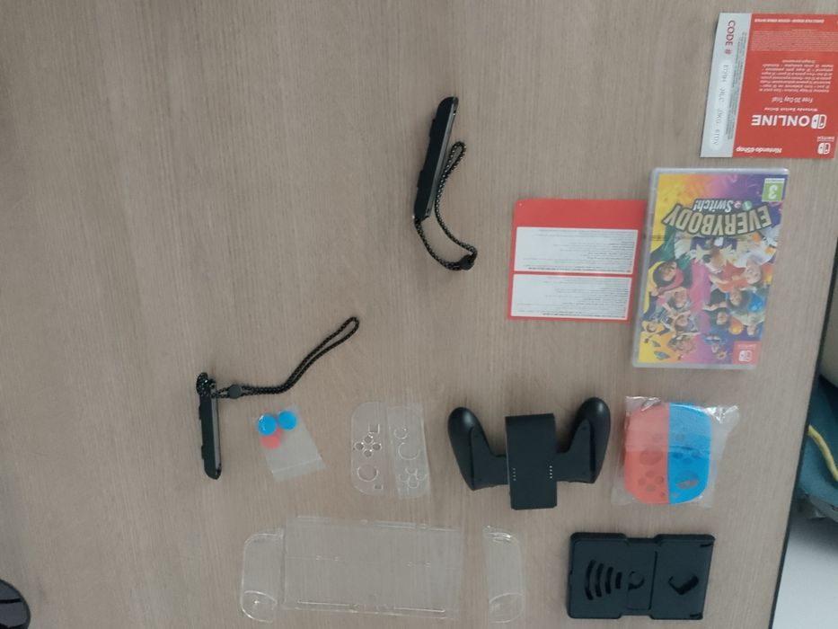 Pachet Nintendo Switch + SSD 1TB(in el) + Accesorii + Joc „1-2-Switch” (Fără cutie)