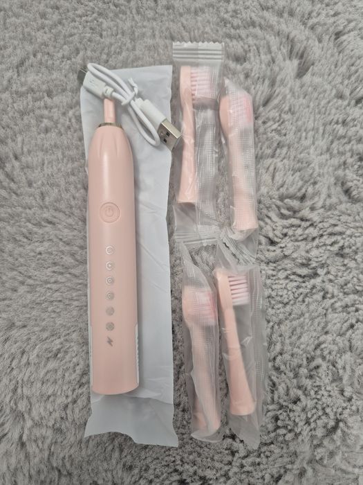 Periuta de dinți electrică roz cu 4 capete de schimbare