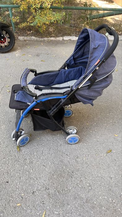 Продам прогулочную коляску Skilmax