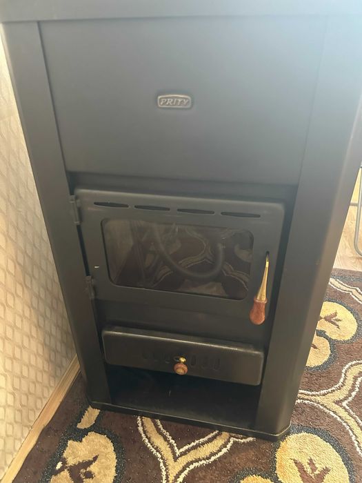 Продавам използвана камина Prity S3 W17 с помпа