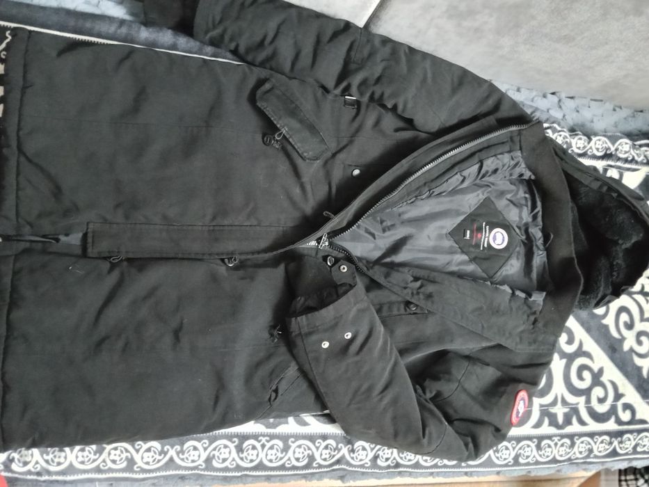 Пуховики женские