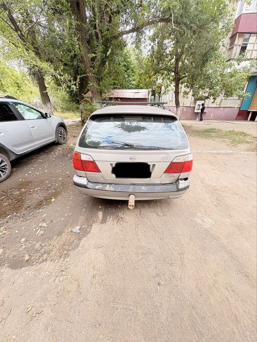 Нисан примера п11