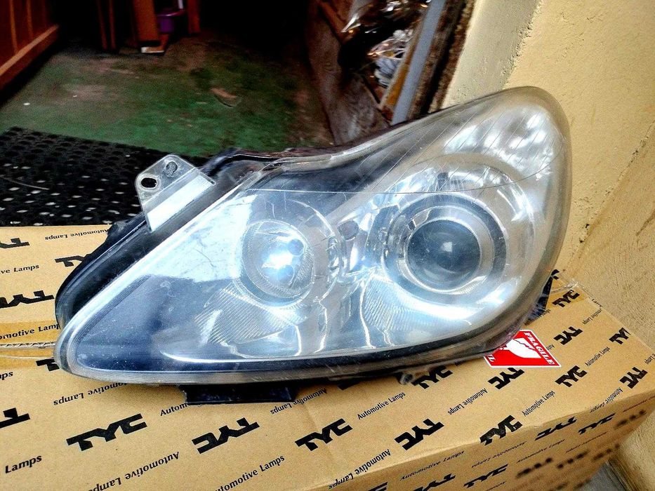 Far original (Stanga)GM Valeo 13186385 pentru Opel Corsa D –Stare bună