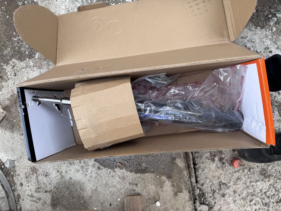 Продам амортизатор бмв е38 перед левый новый и чашка