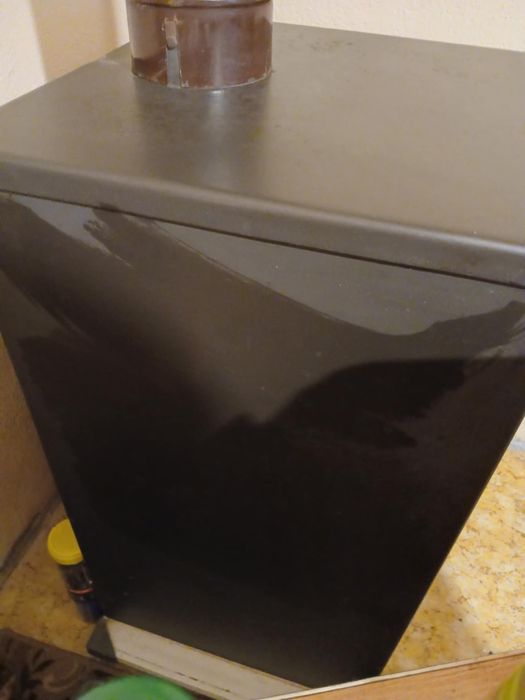 Запазена  камина на твърдо гориво