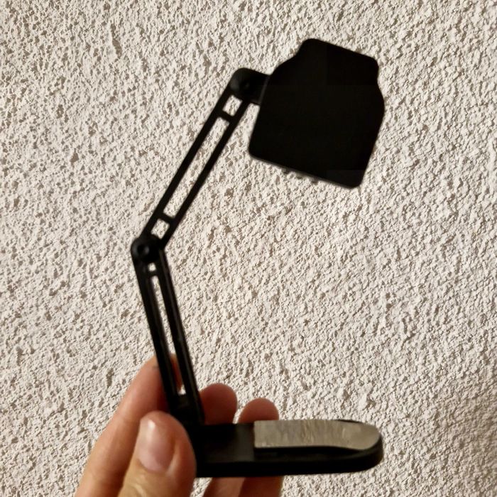 Lampa de citit Kikkerland – pliabilă, compactă, ideală pentru carte