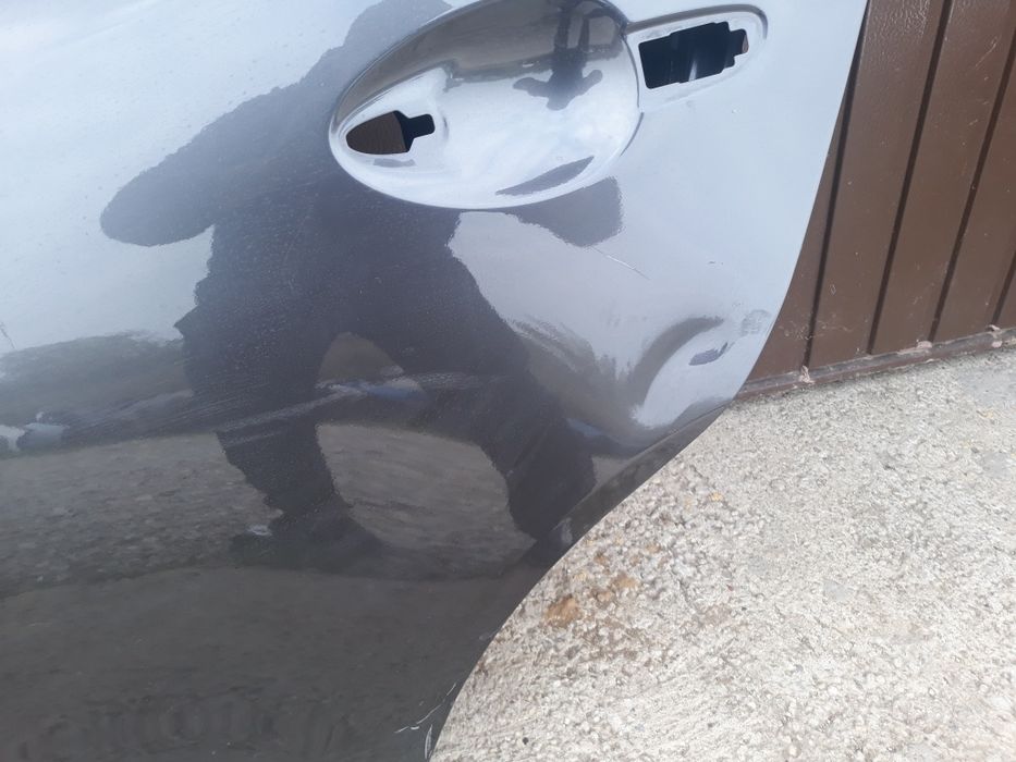 Usa stanga spate mazda 2