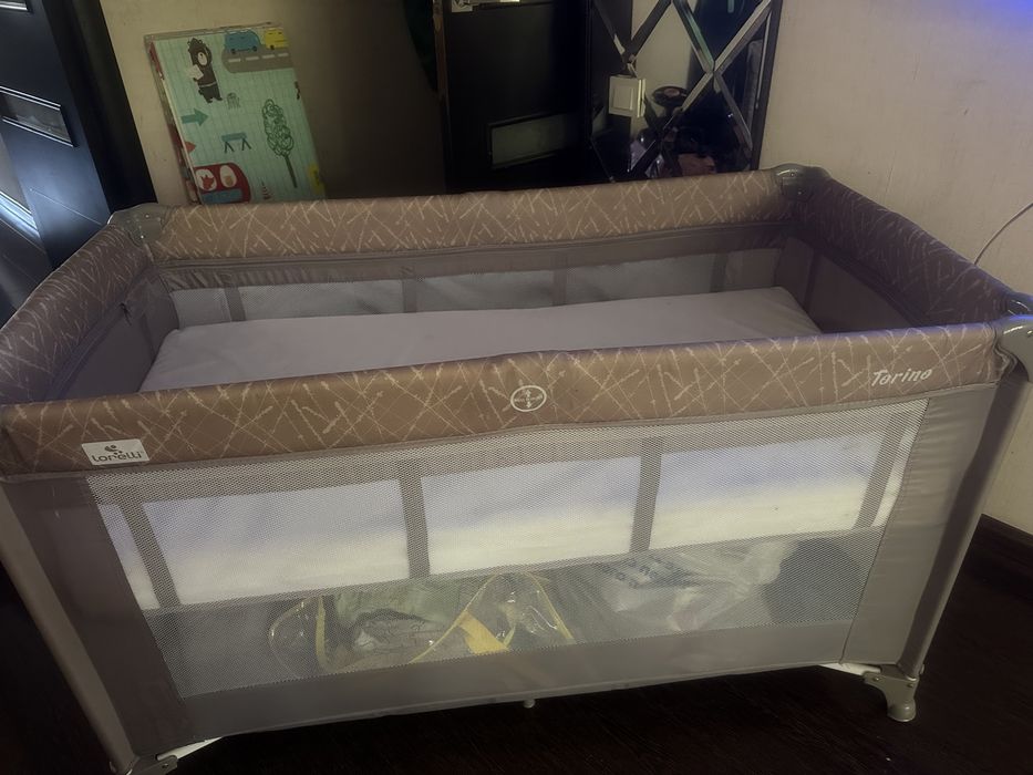 Детская кроватка - манеж