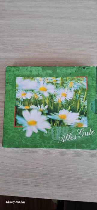 Set Cd+Album , in lb. Germană,  nou