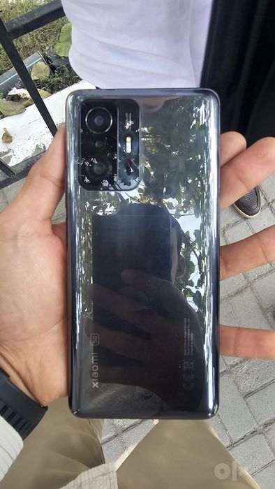 Xiaomi 11 t pro karbkasi bor . Ozini arginal zaryadchigi bor