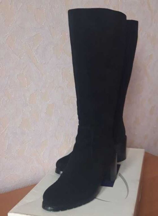 Продам женские кожаные сапоги