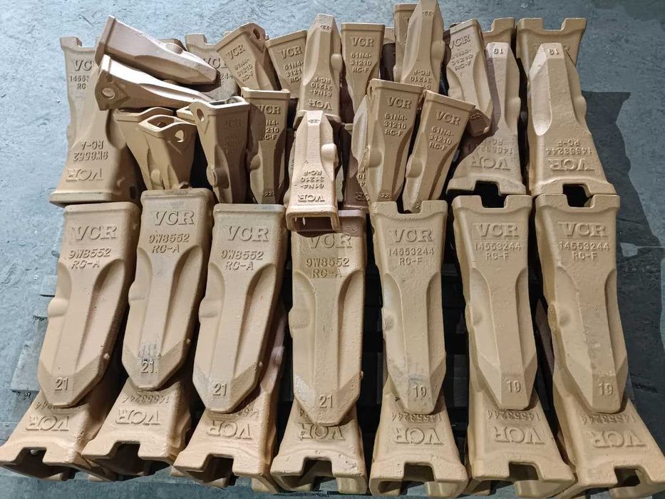 Коронки зубья на экскаваторы