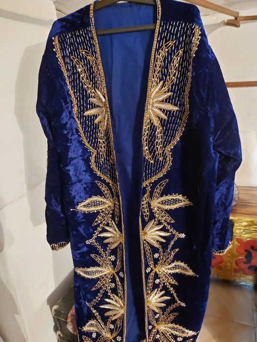 Шикарный шапан новый