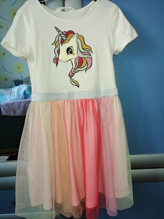 Дрешки 128-134 .