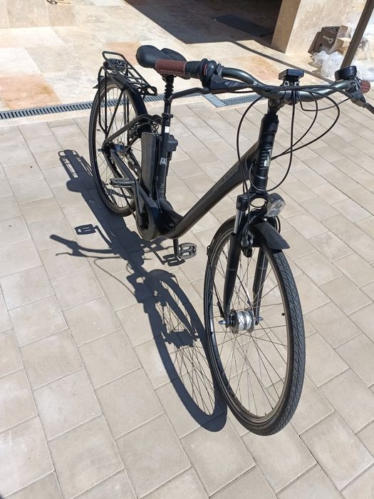 Bicicleta aluminiu passat roti 28 foarte usoara schimbatoare shimano  frane hidraulice tektro draco lichid disc trekking dinam in butuc
