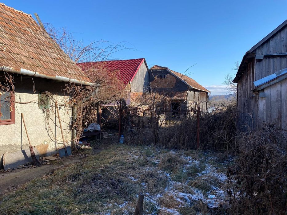 2 parcele de teren in Gilau, una cu casa batraneasca