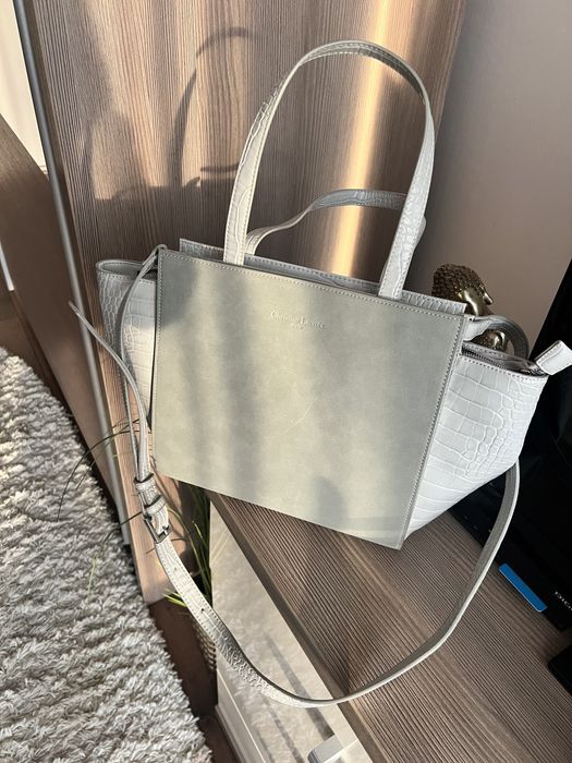 Poseta dama noua ,fără eticheta .culoare gri .Cumpărată din Germania!