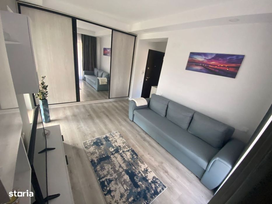 COSMOPOLIS - Apartament Tip studio cu 123 mp gradina,complet mobilat