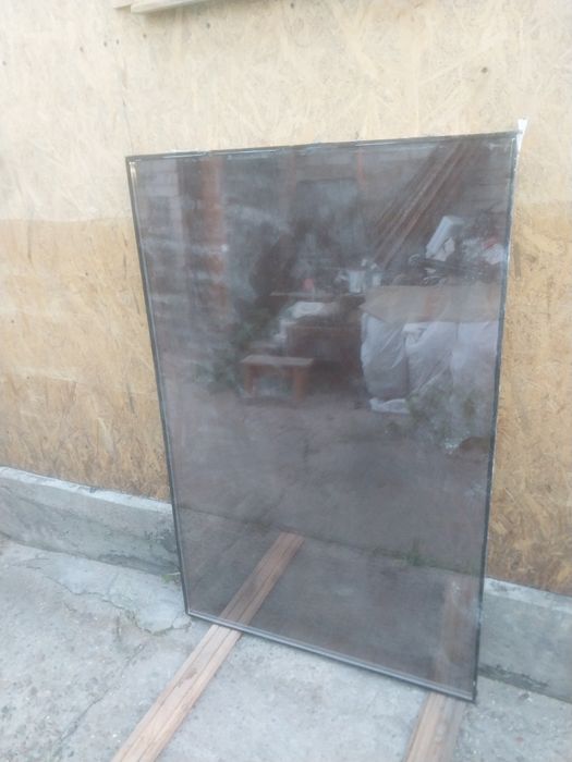 Отдам два стеклопакета.