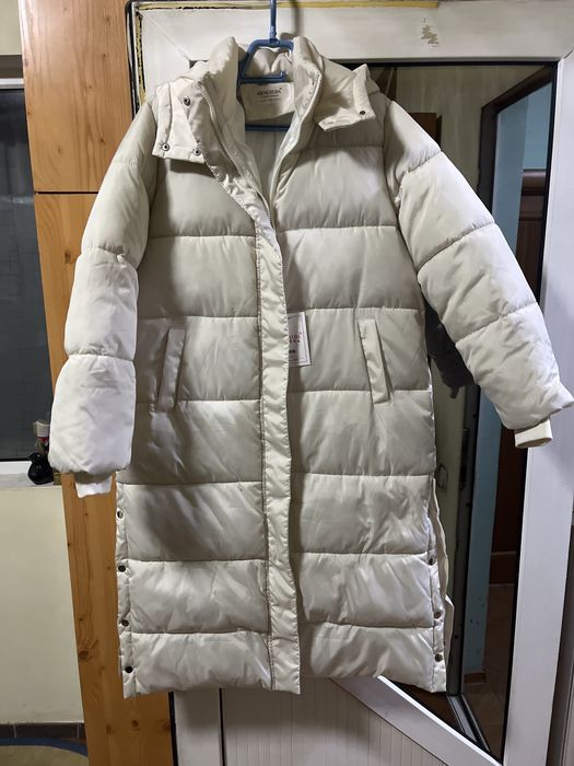 Продам женский зимний пуховик